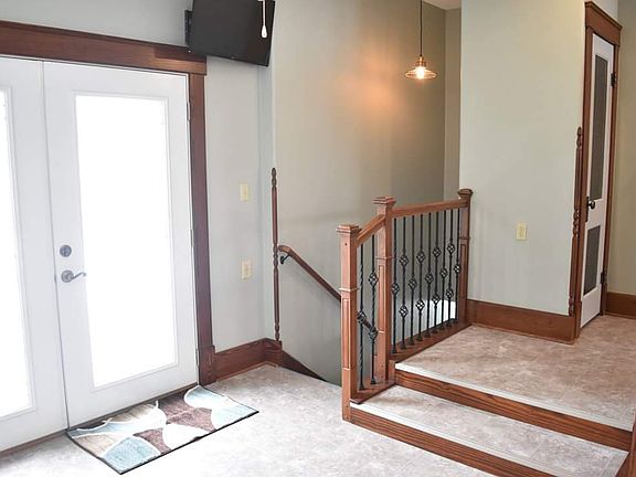 Patio doors and stairs to basement