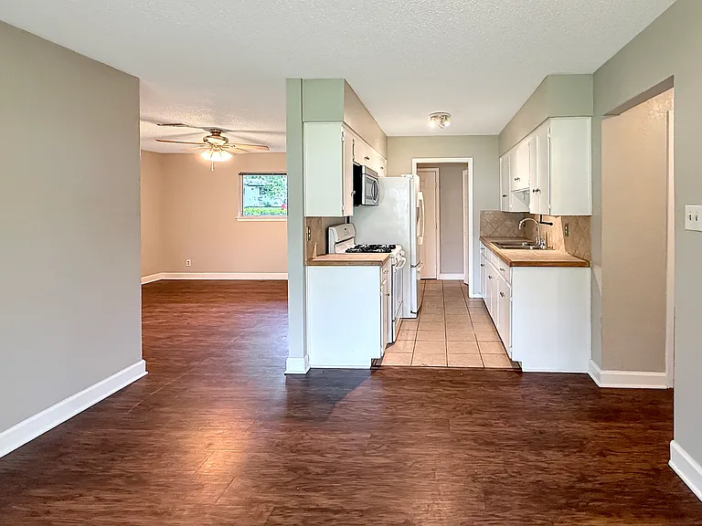 View from Dining Room towards kitchen and living room on the left.