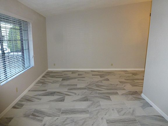 Spacious living room with picture window.