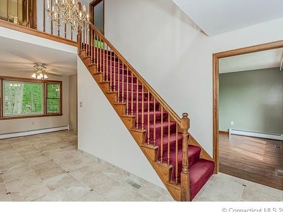 Stairway to 2nd floor w/vie...