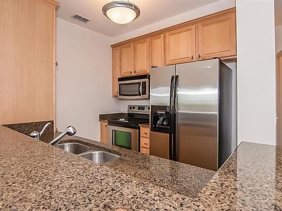 Kitchen with Natural Wood Cabinetry