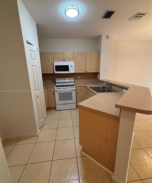 1st image of 6533 Catalina Ln #Townhouse