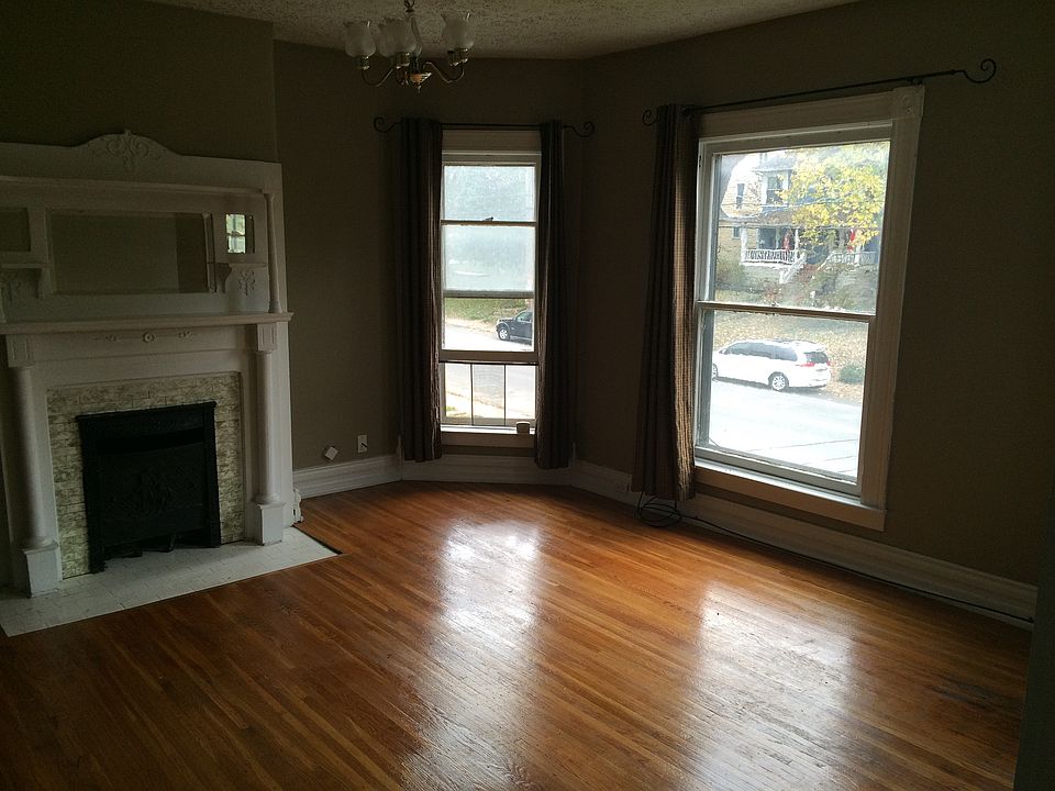 Living room with original fireplace