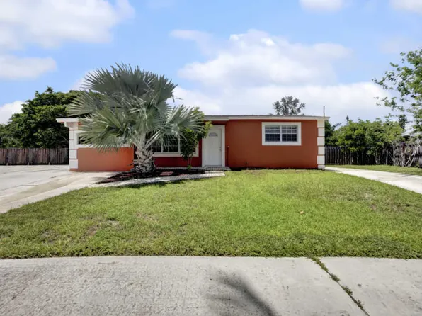 161 Cayman Dr, Palm Springs, FL 33461