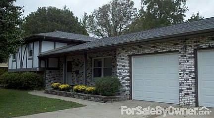 Summertime Paradise!
						:
						Two patios, diving board and slide complement this 20x40 concrete inground pool.