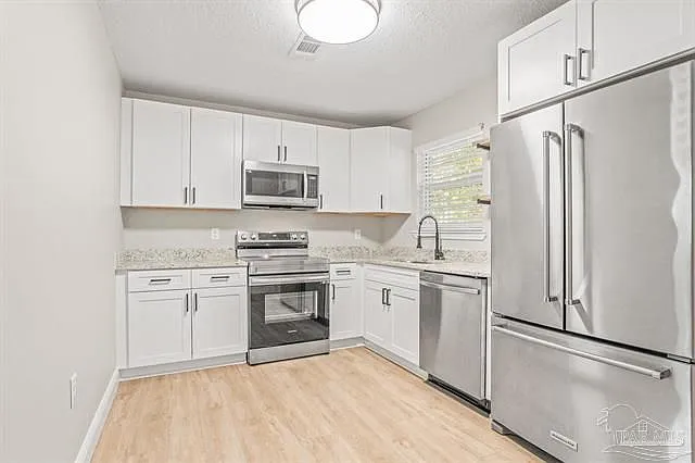 207 Ajax Dr NW — Photo 1