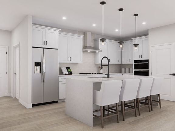 Gourmet Kitchen with Expansive Island Seats 4 Comfortably