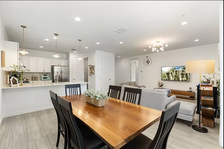 Comfortable dining space with seating for gathering and conversation for up to six people.