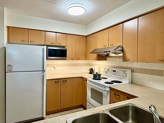 2nd image of 6028 Willingdon Ave #500