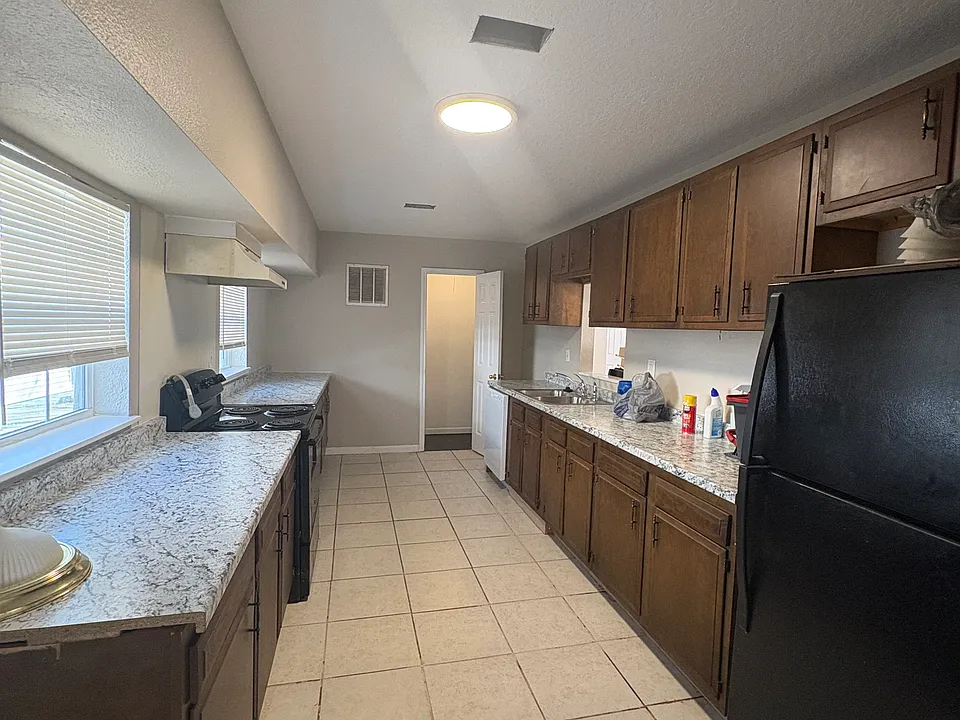 Long spacious kitchen with a ton of counter space