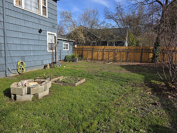 Backyard, partially fenced