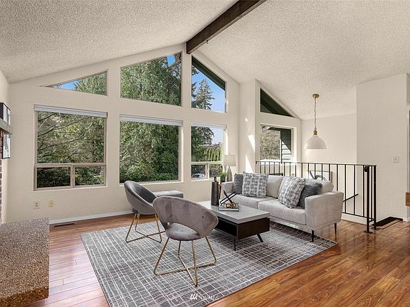 An abundance of windows to enjoy the natural scape.