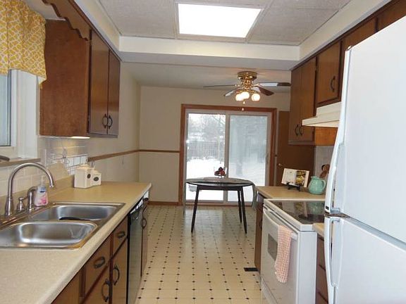 Spruced up and ready with new counters, sink and back splash.  Appliances all stay with the home.
