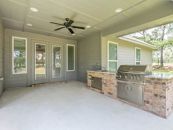 Enjoy the gorgeous views from your covered outdoor kitchen.
