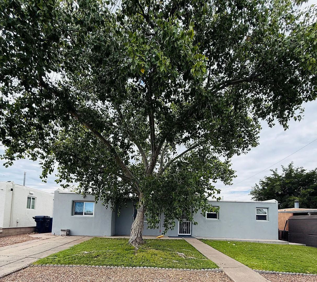 Pride of Ownership beams from this NE Heights 3 Bedroom 1.5 Bath home — Photo 1