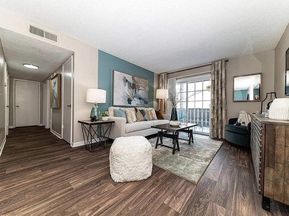 Spacious living room with hardwood-style flooring