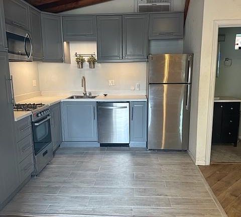 Kitchen, dishwasher, disposal, fridge/freezer, LOTS of cabinet space, Gas range, microwave