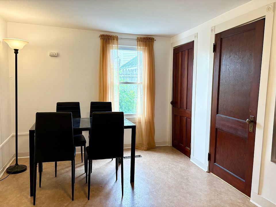 Doors to coat closet and 1/2 bathroom with washer/dryer