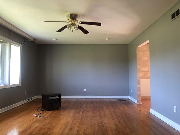 Living Room leading to Dining Room and Kitchen