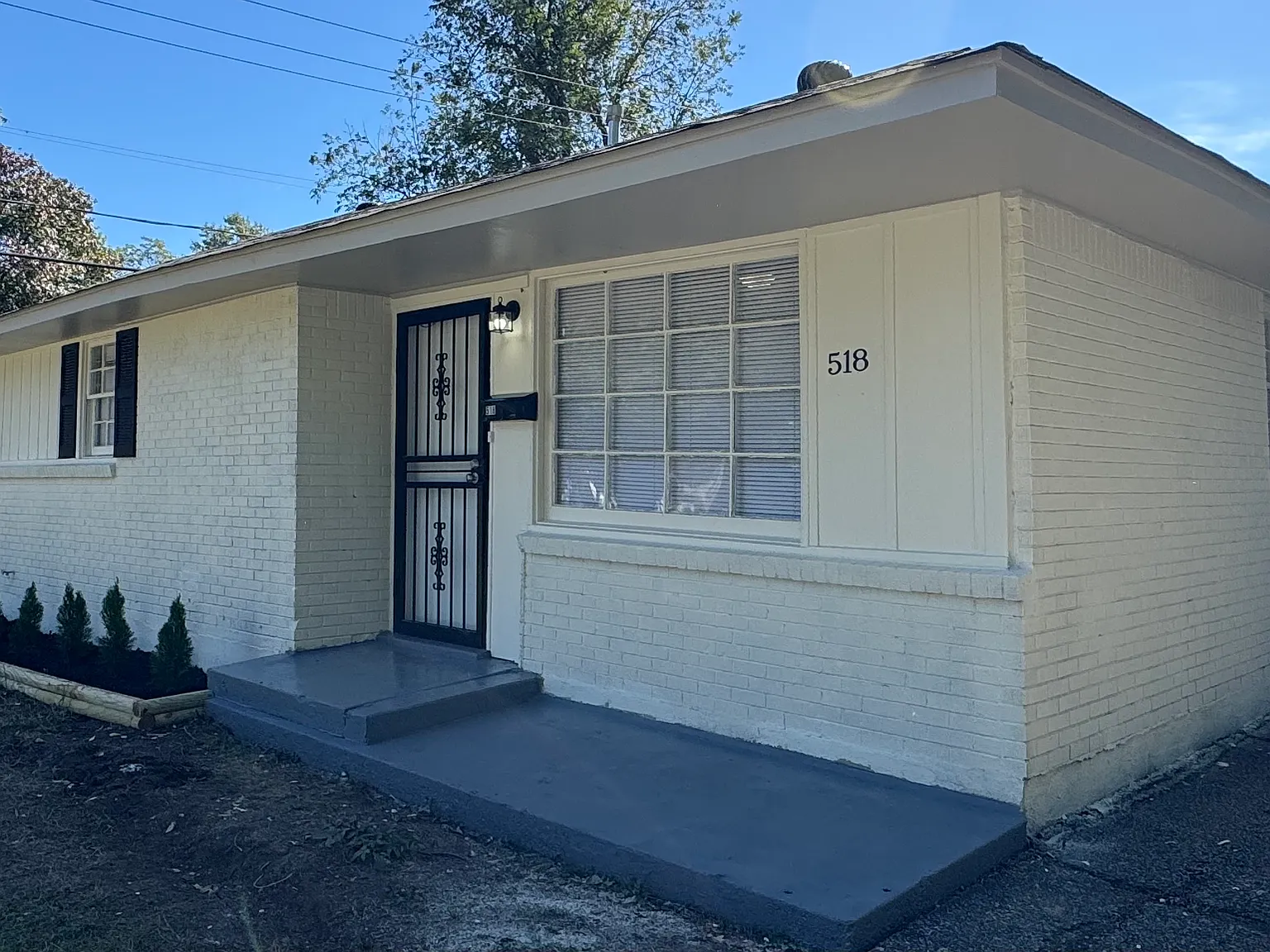 Bright and Inviting 3-Bedroom Brick Home with Fenced Backyard — Photo 2