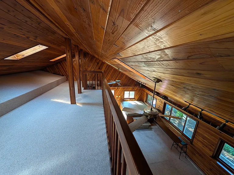 Loft with view down (the loft has two whole house fans for quick cooling/air flow to reduce need for AC)