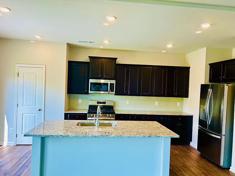 Kitchen + Pantry with larger sink
