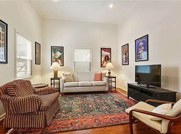 A close-up view of the current portion of the living area being used as a living room. To be sure, should someone want to create a second bedroom, there is room to do so.