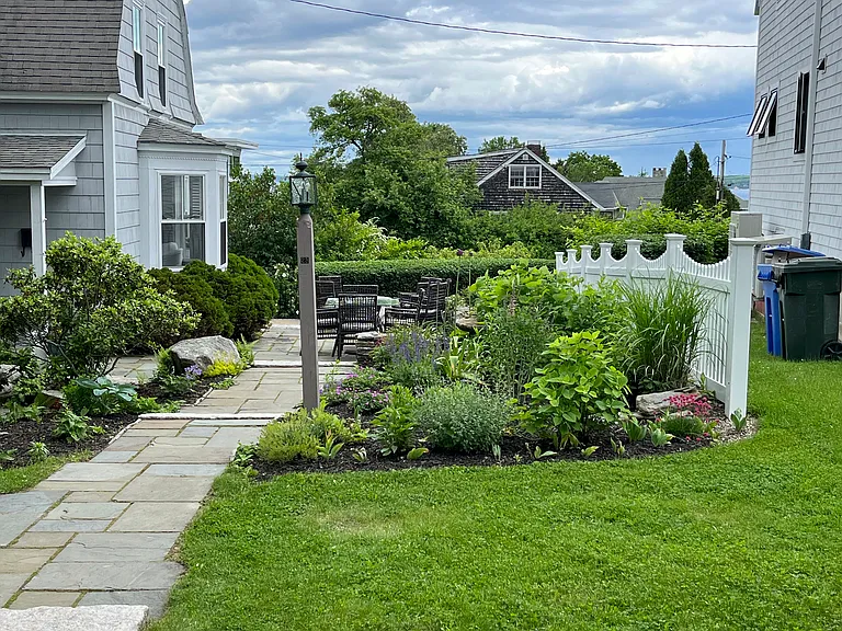 Beautiful English gardens surround the property.