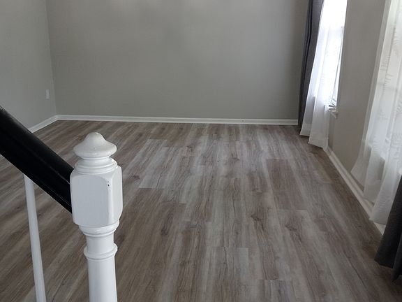 Large Front Room (15'9" x 11'4") with 2 windows.