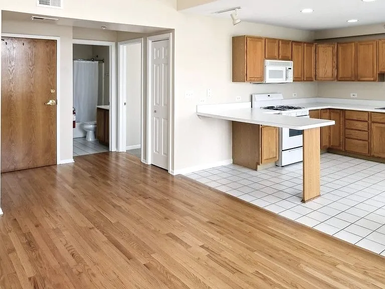 Open floor plan, living room to kitchen.
