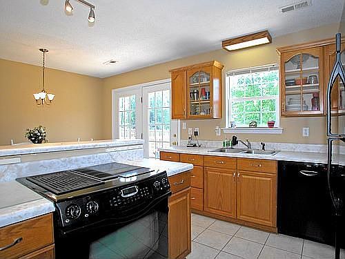 Kitchen with top shelf appliances