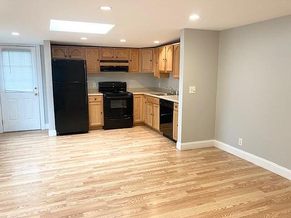 Bright open kitchen and family room with room for a table or island