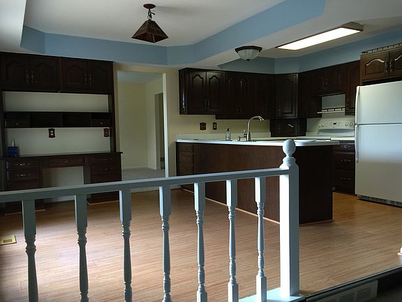Kitchen with cherry cabinets