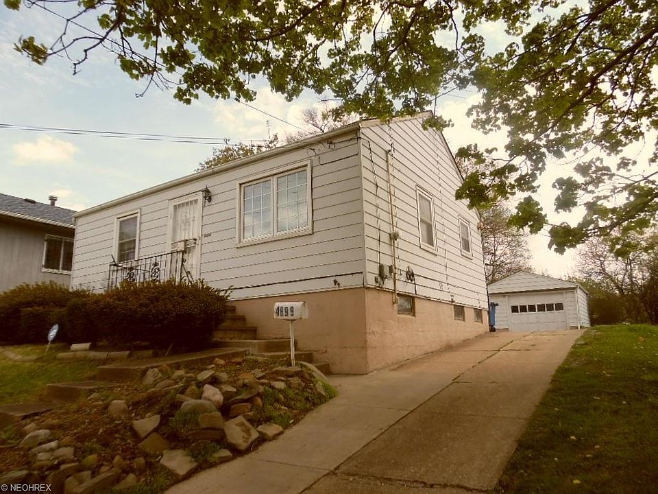 Welcome to 4899 Lee Road!  This property offer two bedroom with 1 bath, an eat-in kitchen and a lower level recreation room with laundry area and lots of storage.