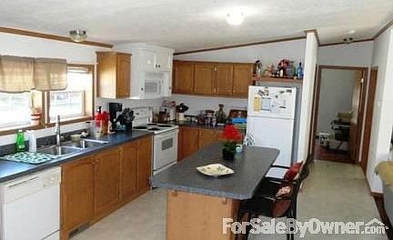 Large Kitchen
						:
						Large Kitchen Island. Tons of cabinet space for storage.
