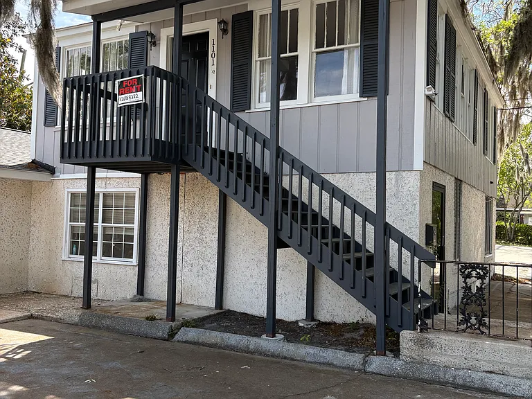 Apartment located upstairs above Chiropractic office at the corner of Waters Ave and 51st Street.