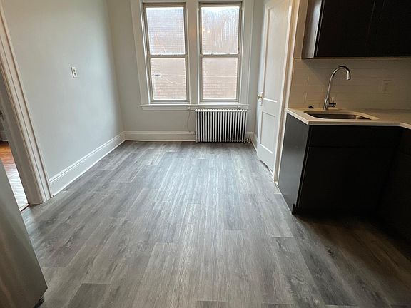 THE LIVING SPACE AND KITCHEN IS ALL IN ONE ROOM / NO SEPARATE LIVING ROOM