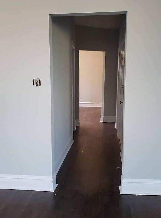 Hallway looking from living room into dining room