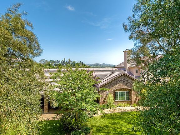 Custom brickwork on exterior front of home.
