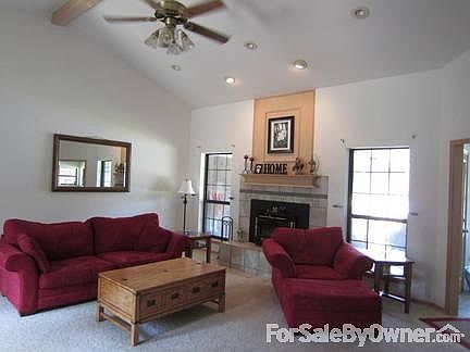 Living Room
						:
						Fireplace, Vaulted Ceiling and Recessed Lighting