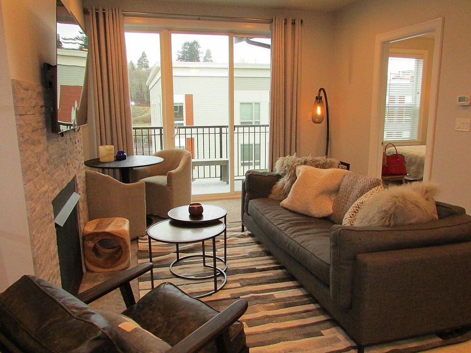 Beautifully accented with a stone fireplace, the living room offers a quiet sanctuary you will enjoy coming home to every day.