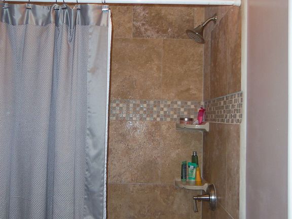 Travertine Tile and Jetted Soaker Tub