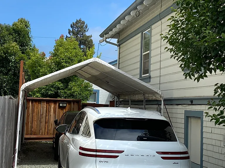 Covered carport, off street parking for two cars