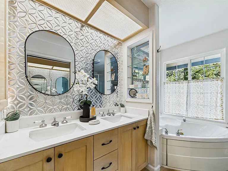 +Attached to primary bedroom
+Double sinks
+Jetted tub + stand-up shower
