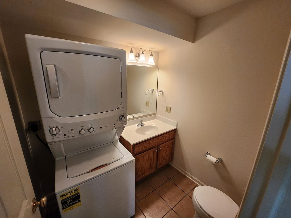 Powder Room with stack washer & dryer
