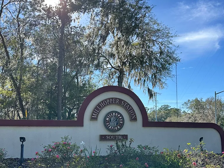House located in Grand Station at Millhopper Station neighborhood.