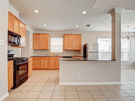 4th image of 7107 Thistlewood Park Ct