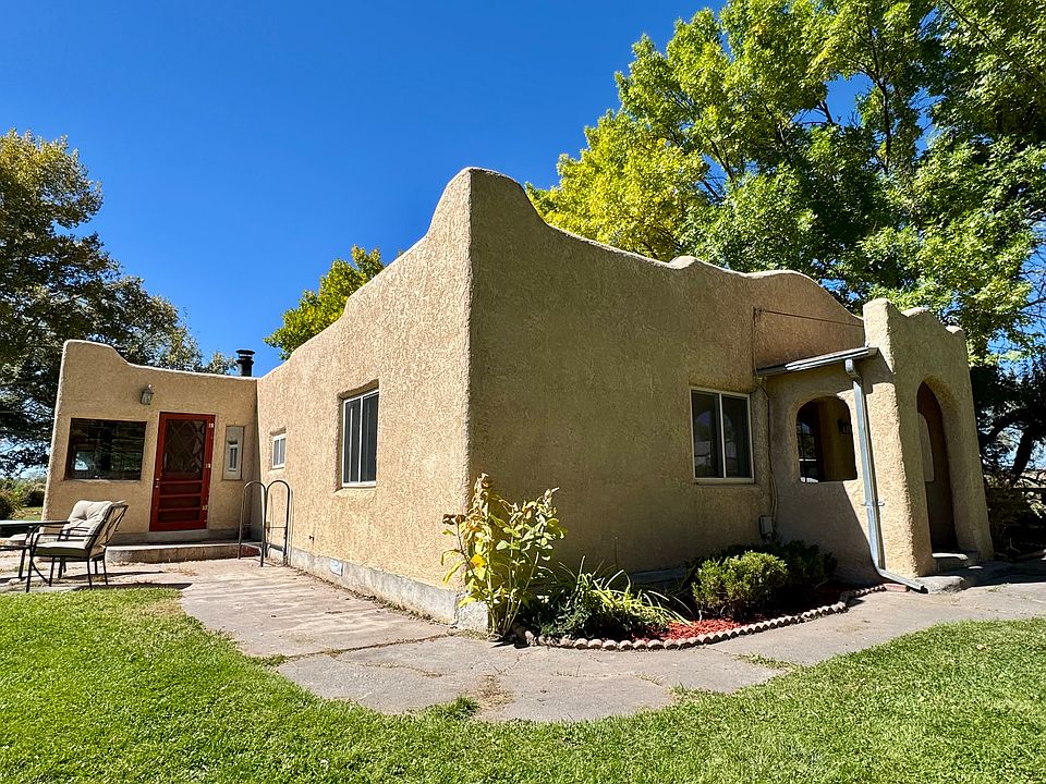 Exterior front of Adobe house
