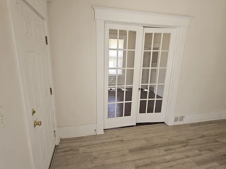 French doors to bedroom or dining room.