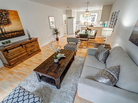 Spacious living area with kitchen, dining roon and family ro